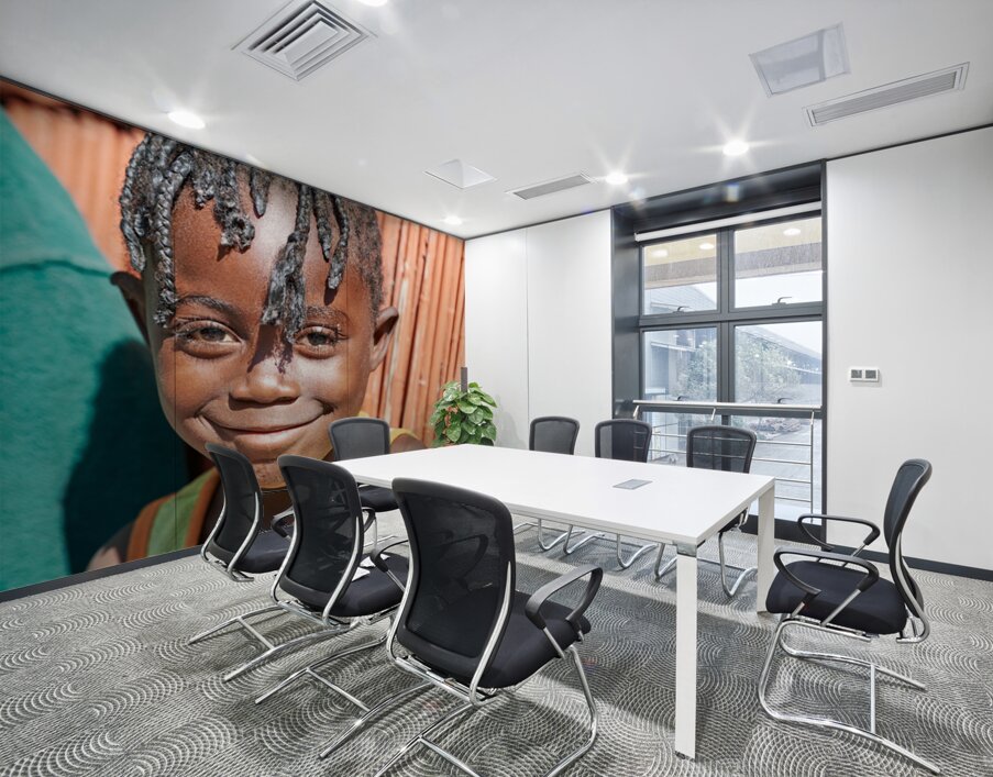 Joyful child smiles in Kavango Region of Namibia Wall Printing