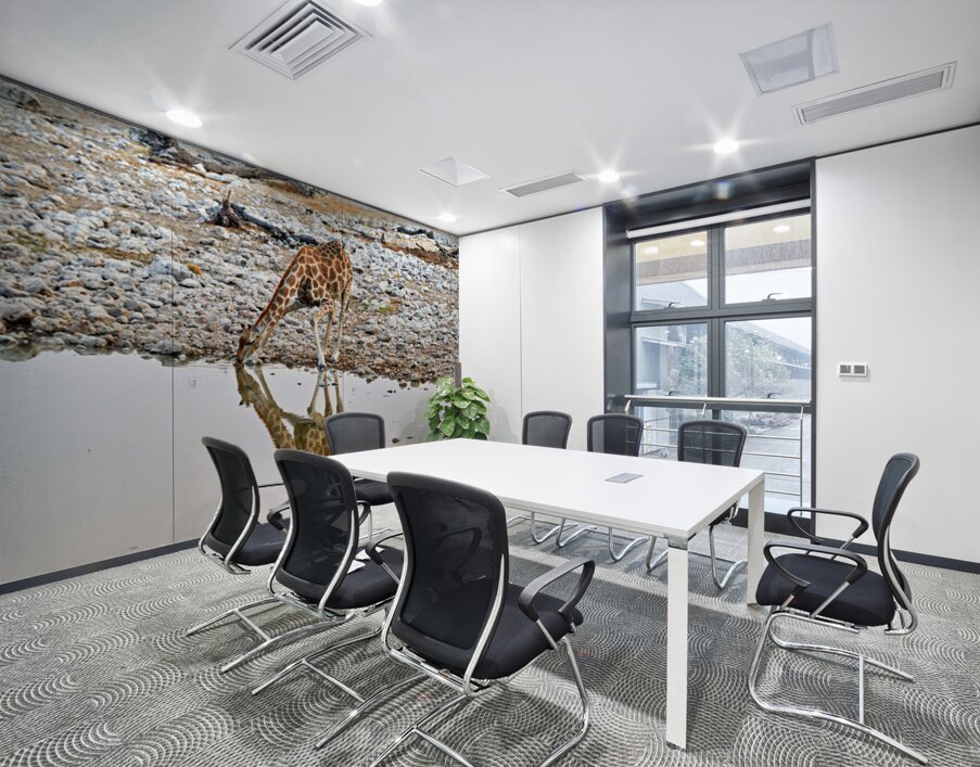 Giraffe drinks water at a waterhole in Etosha National Park Nam Wall Printing