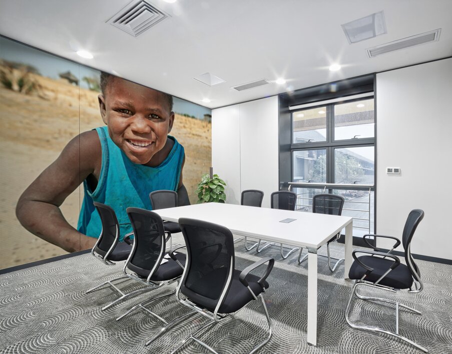 Joyful boy in Kavango Region of Namibia enjoys a moment outside Wall Printing
