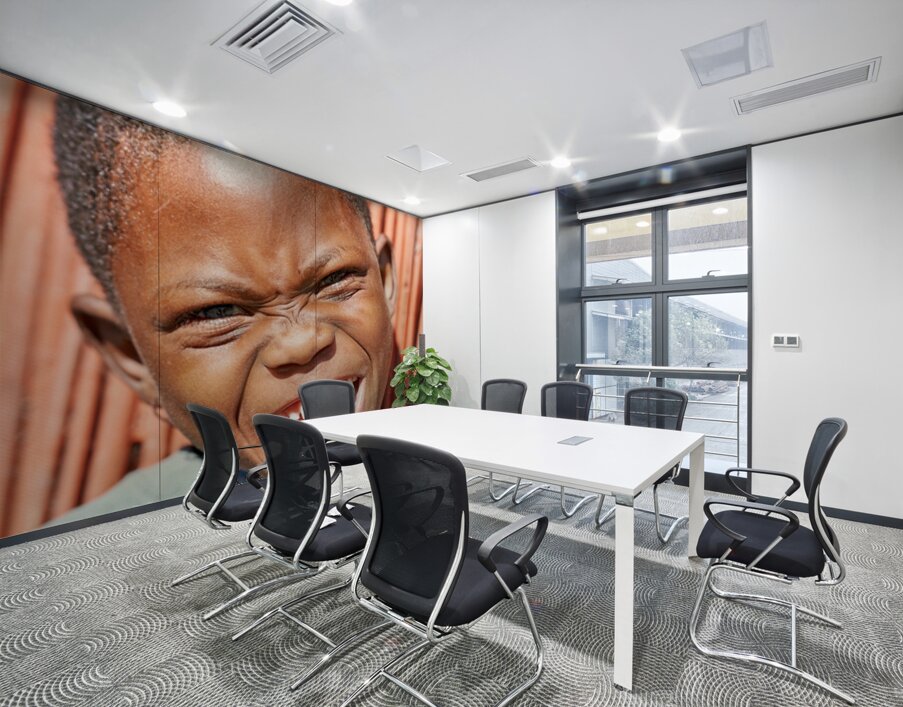 Joyful child smiles in Kavango Region of Namibia Wall Printing