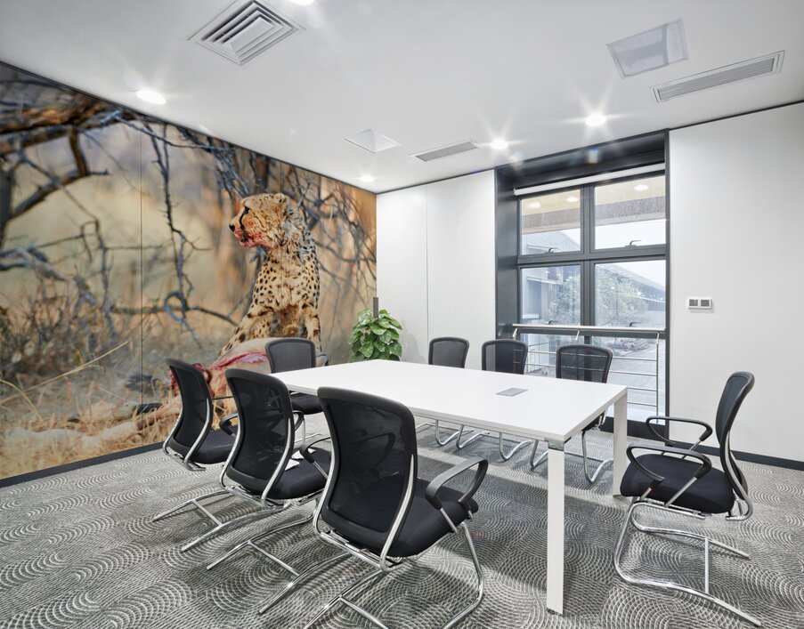 Cheetah feeds on prey in okonjima reserve in namibia Wall Printing