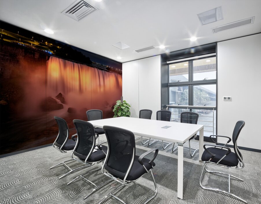 Niagara Falls illuminated orange at night. Wall Printing