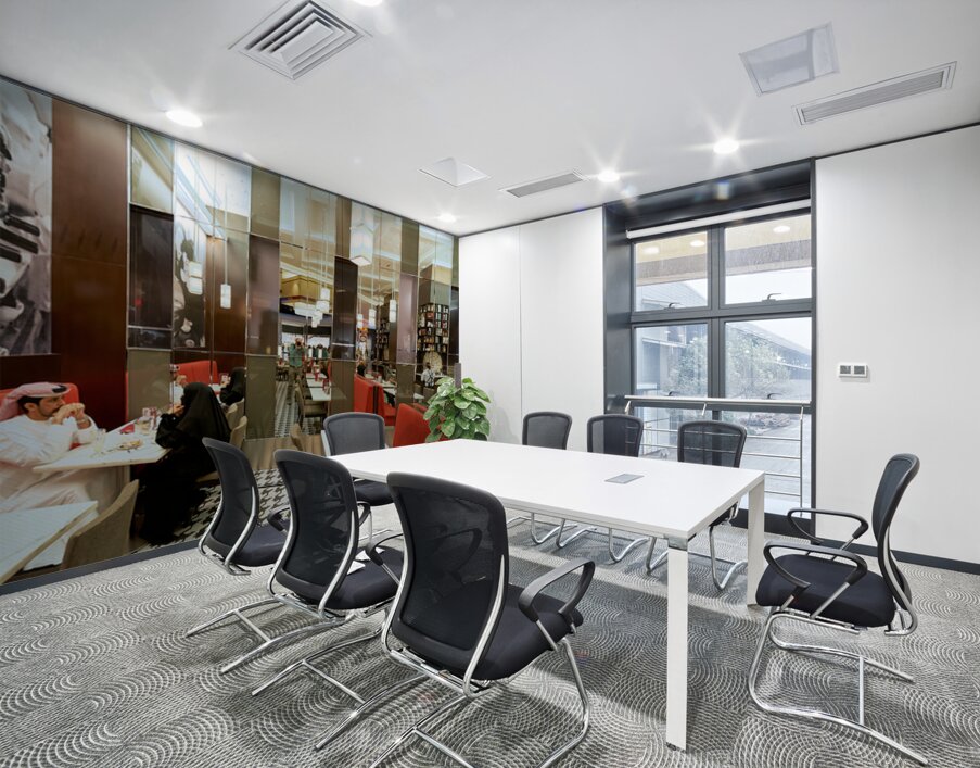 Dining in a modern restaurant with reflective walls in Dubai Wall Printing