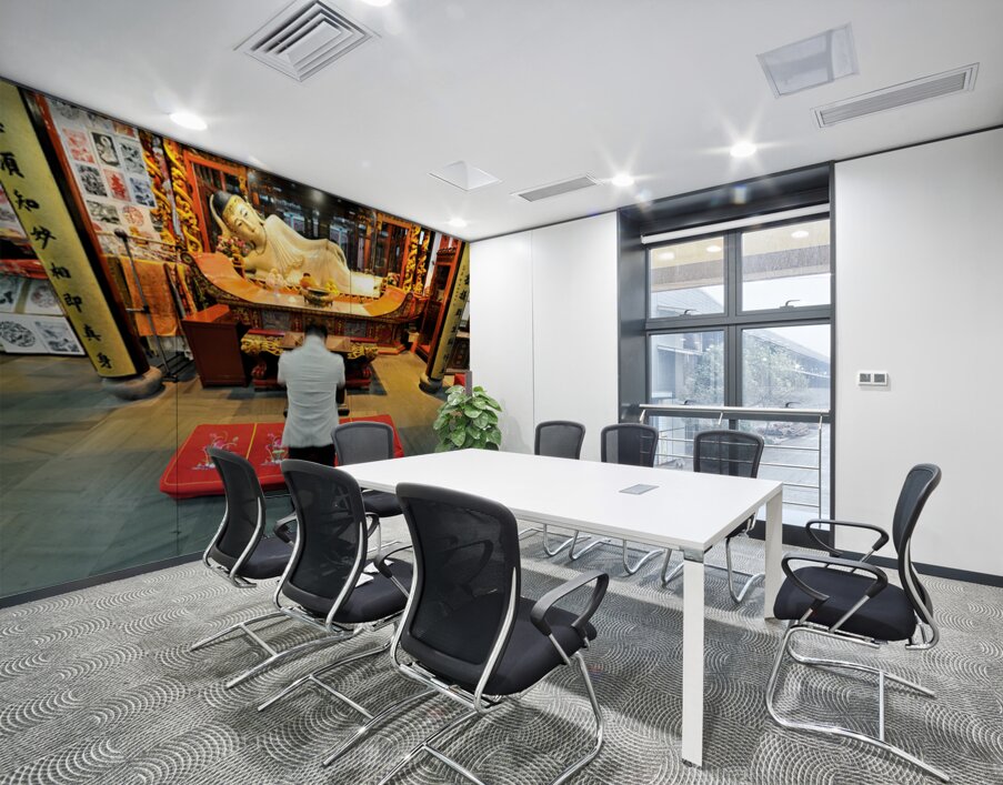 Worshipper kneels before Buddha statue in Shanghai temple Wall Printing
