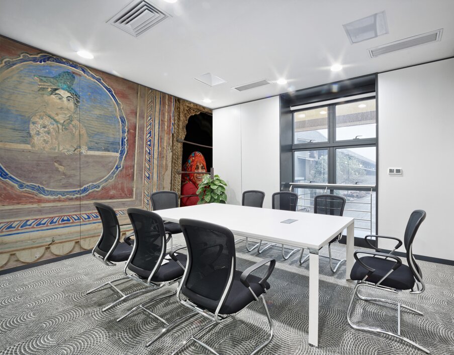 Woman smiles while looking out of a window in Mandawa Rajasthan Wall Printing