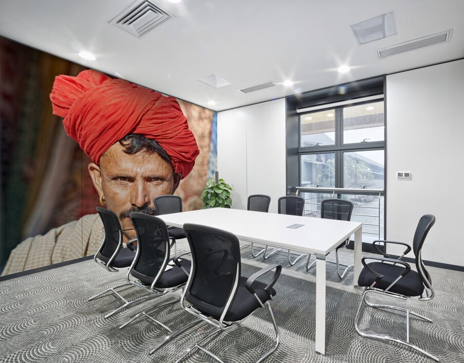 Man in red turban poses in Rajasthans Jaisalmer market street Wall Printing