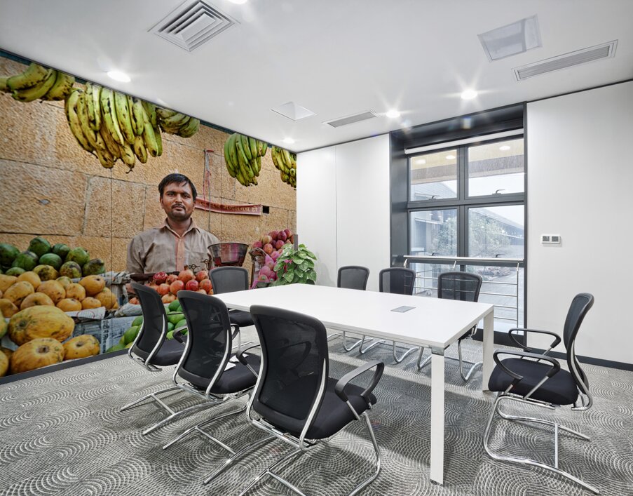 Fruits and vegetables stall in Jaisalmer with vendor at work Wall Printing