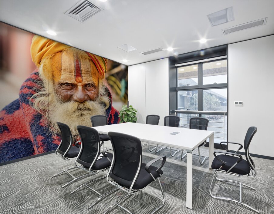 Old holy man in Varanasi wearing bright colors in Uttar Pradesh Wall Printing