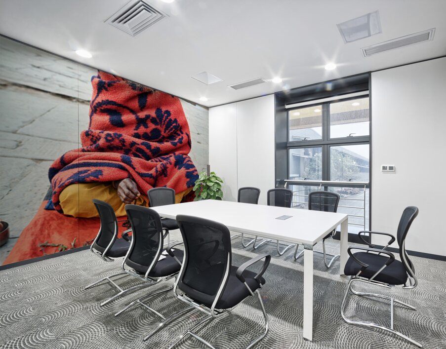 Holy man sadhu sits with offerings in Varanasi Uttar Pradesh Wall Printing