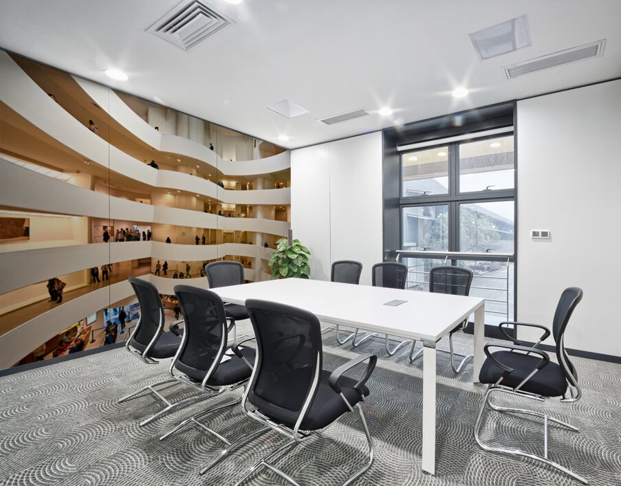 People walk and observe art in the Solomon R Wall Printing