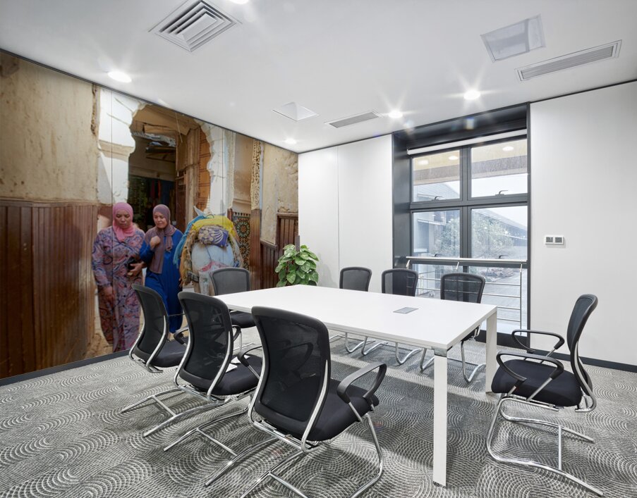 Women walking with donkey in narrow alley of Fez Medina Wall Printing
