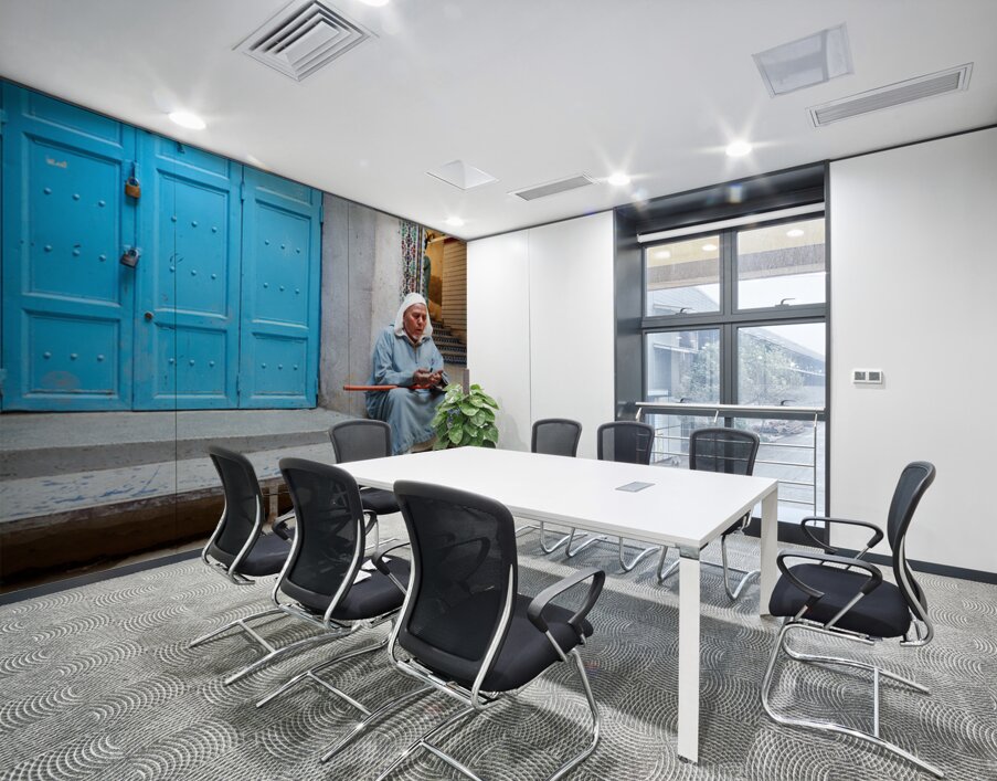 Portrait of a beggar sitting by a blue door in Fez Morocco Wall Printing