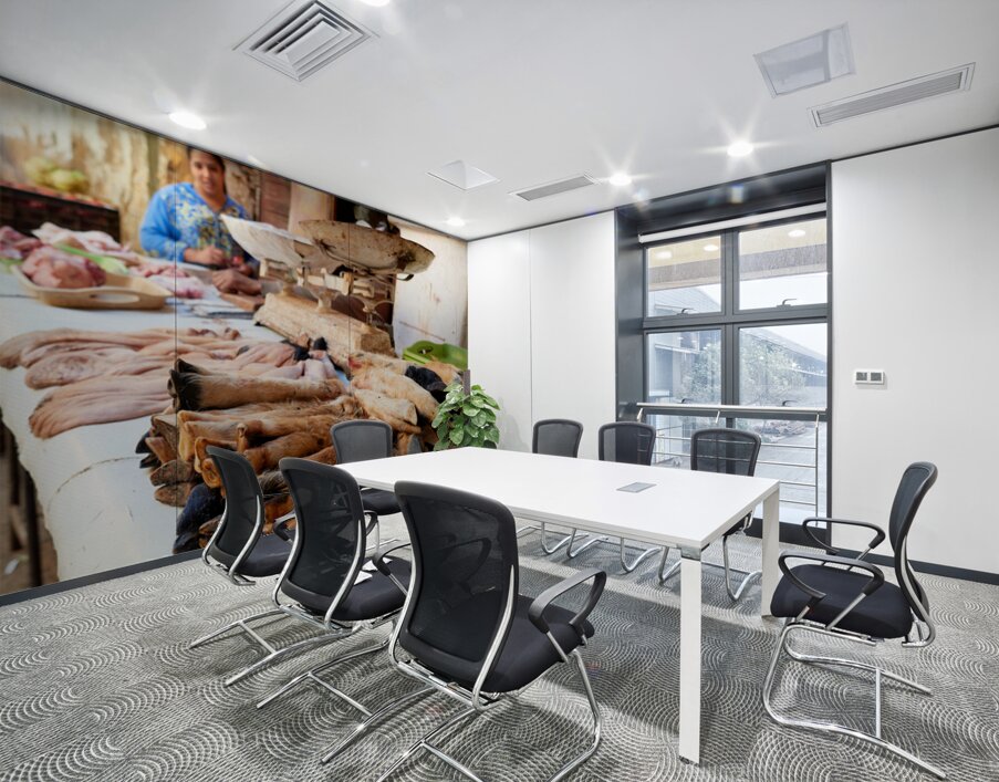 Butcher working in Meknes souk with various cuts of meat Wall Printing