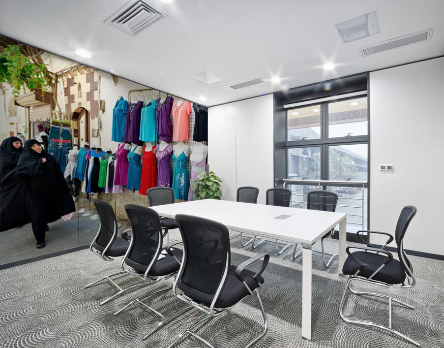 Women walk past colorful clothing displays in Damascus Syria Wall Printing