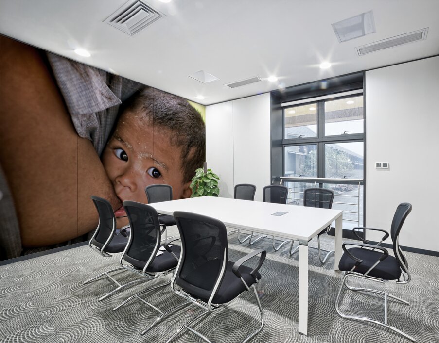 Feeding a baby in Myanmar during daytime hours Wall Printing
