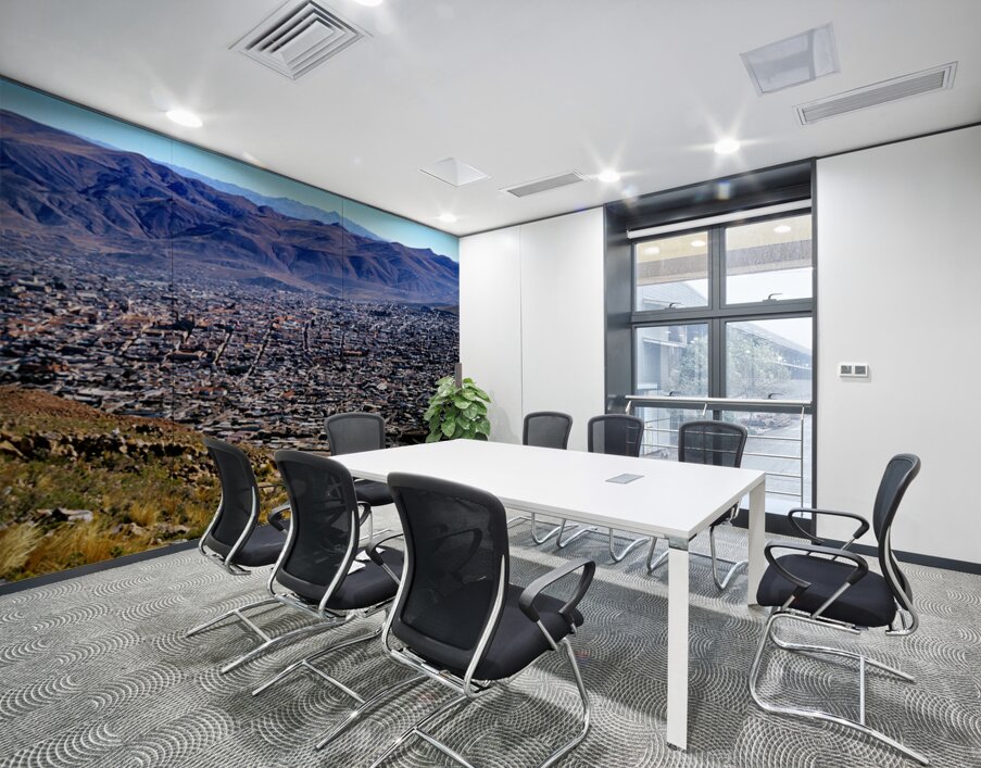 Panoramic view of a sprawling city in a mountain valley. Wall Printing