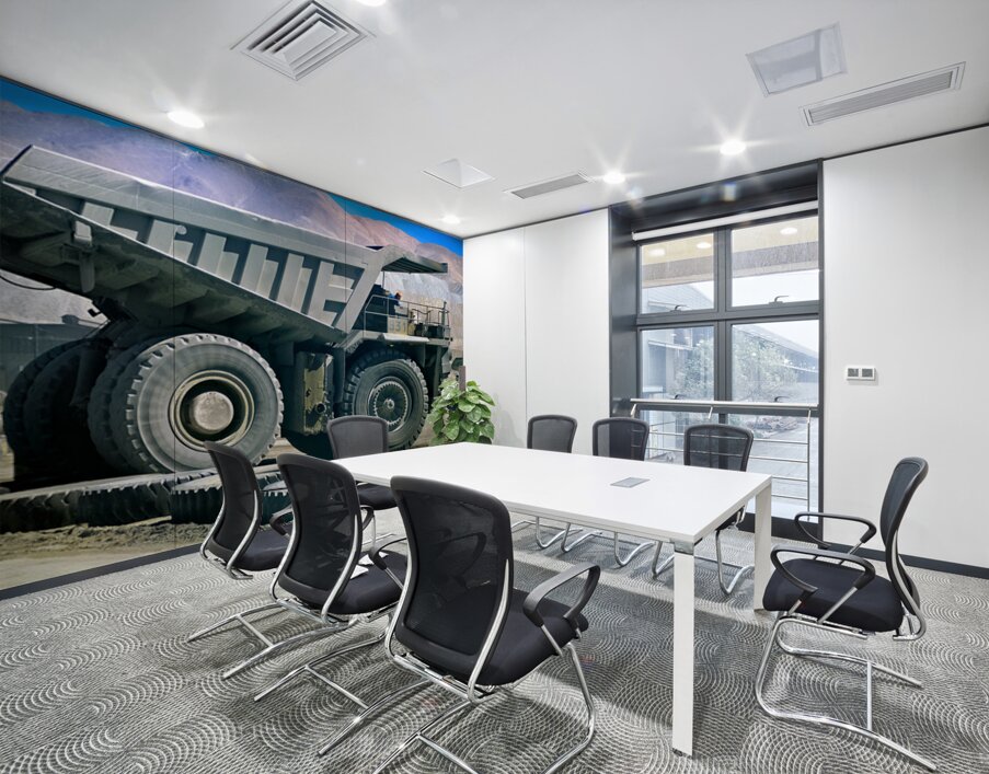 Giant mining dump truck in a dusty mountain quarry. Wall Printing