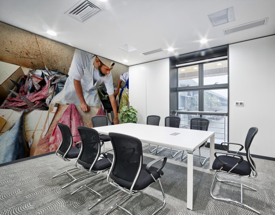 Fish market in Muscat Oman shows a vendor at work Wall Printing