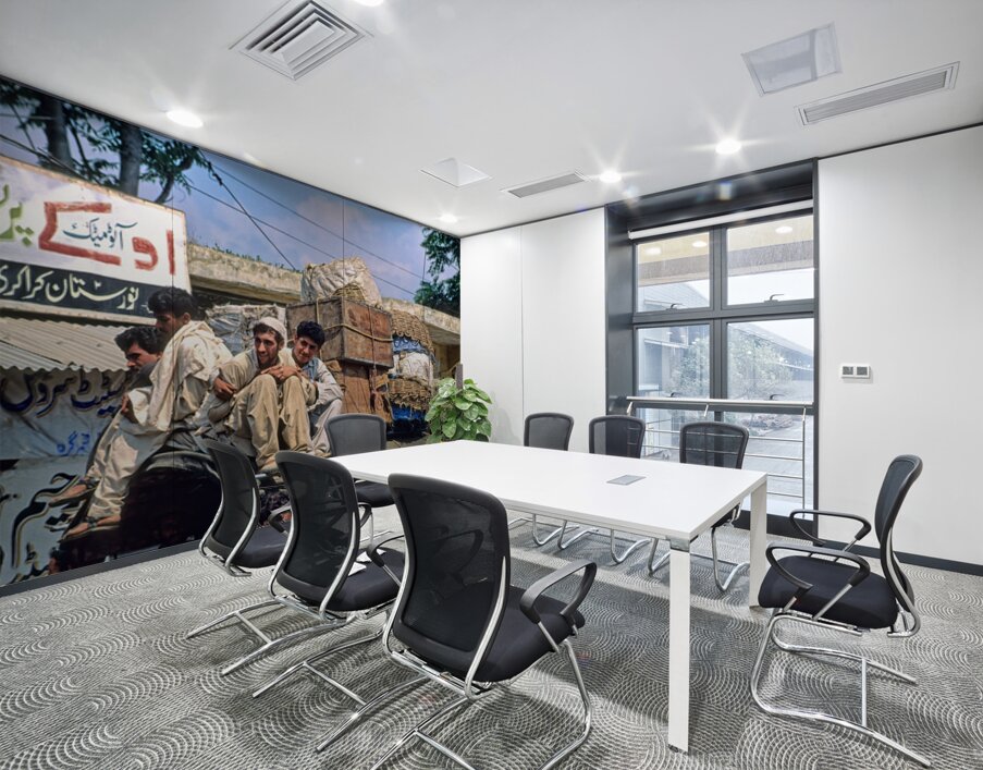 Men travel on top of a vehicle in Peshawar Pakistan Wall Printing