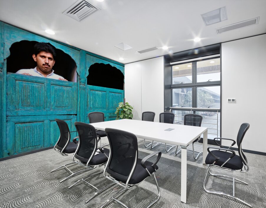 Man looks out from window in Lahore Pakistan Wall Printing
