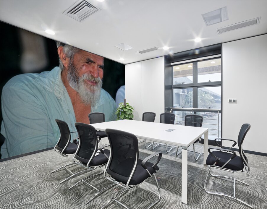 Elderly man smiles while sitting outdoors in Bukhara Uzbekistan Wall Printing