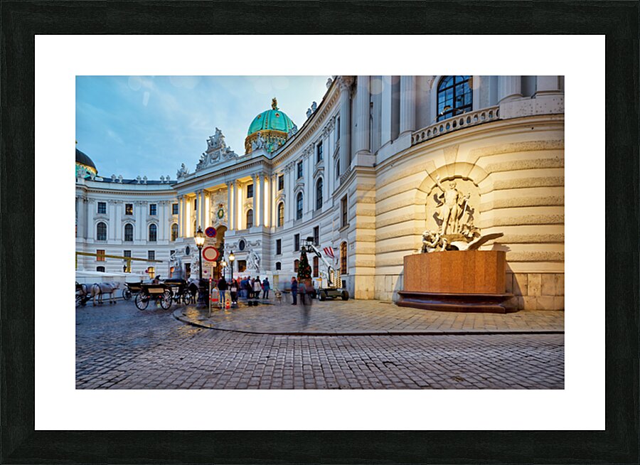 Illuminated Hofburg Palace Vienna with people and horse carria Picture Frame print