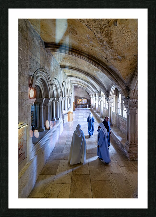 Nuns walk in the cloister of Vezelay Abbey in Bourgogne France Picture Frame print