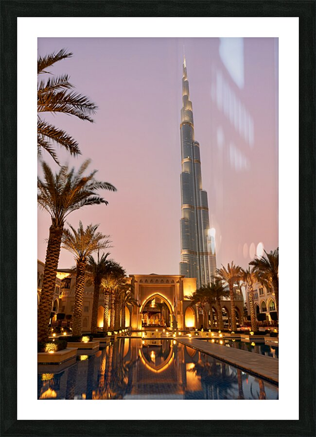 Burj Khalifa stands tall at dusk in Dubai Picture Frame print