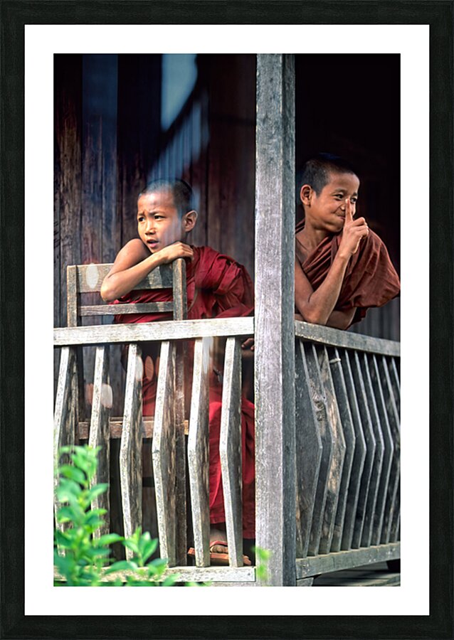 Monks sitting on balcony in Kalaw village Myanmar Picture Frame print