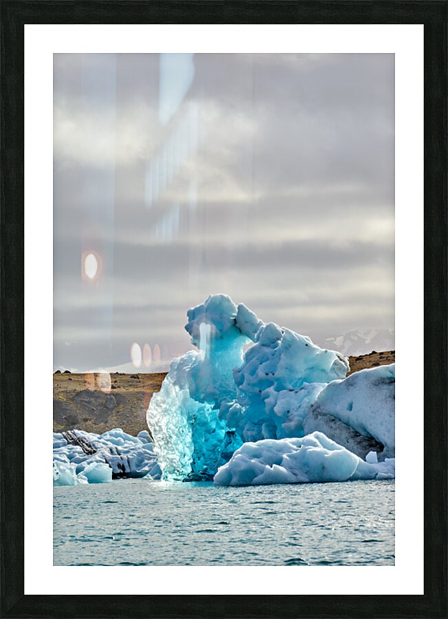 Icebergs float in Jokulsarlon lagoon Iceland by day Picture Frame print