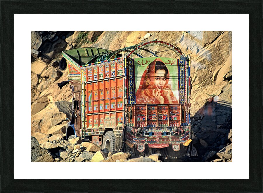 Trucks carrying goods to Shandur Pass in Pakistan Picture Frame print