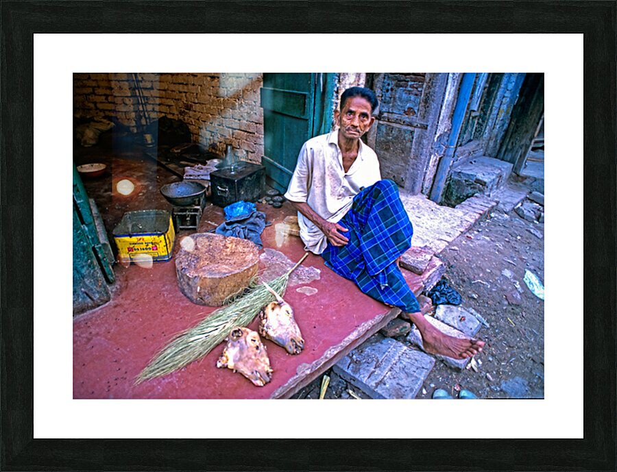 Street butcher working in Lahore during daytime hours Picture Frame print