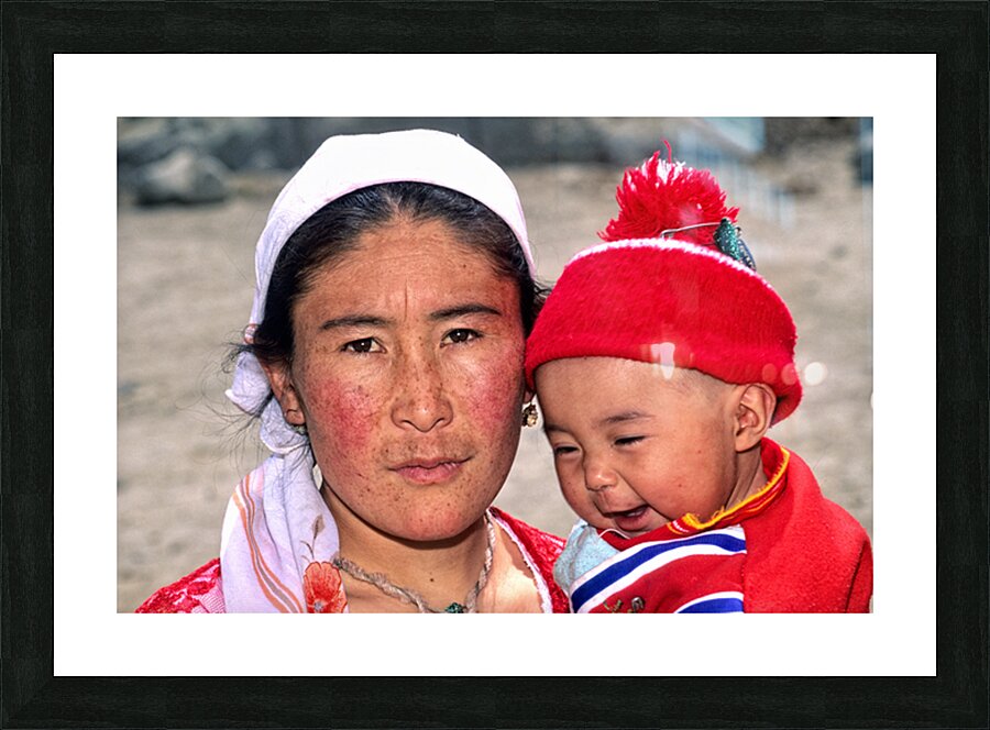 Mother and child in Uzbekistan during daily life activity Picture Frame print