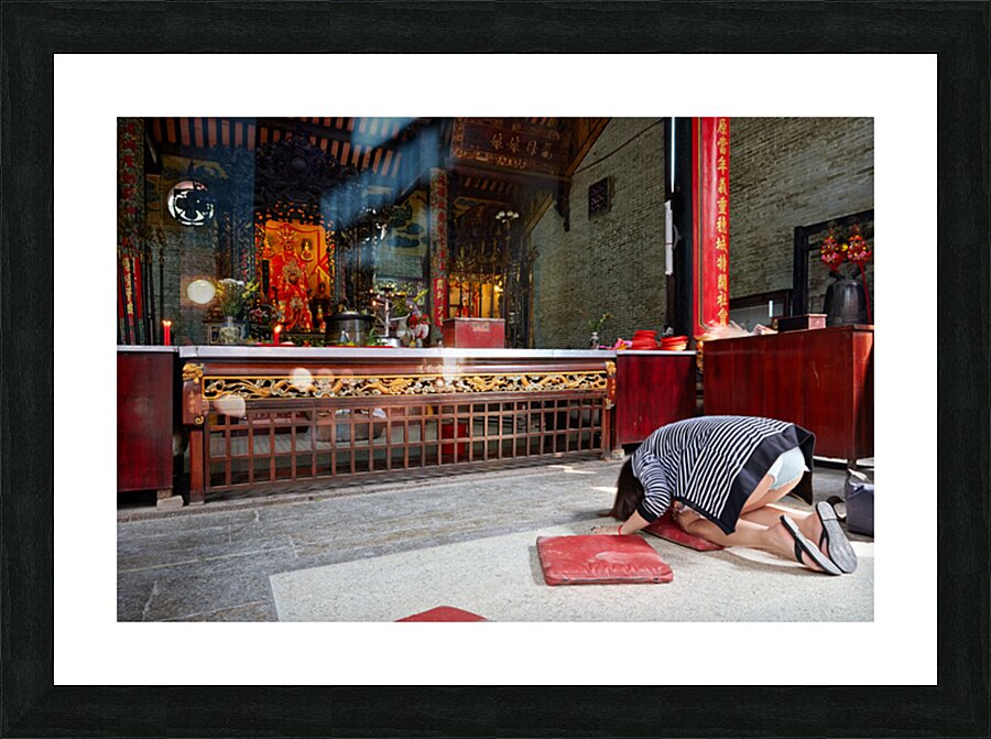 Worshippers at a temple in Ho Chi Minh Vietnam Picture Frame print