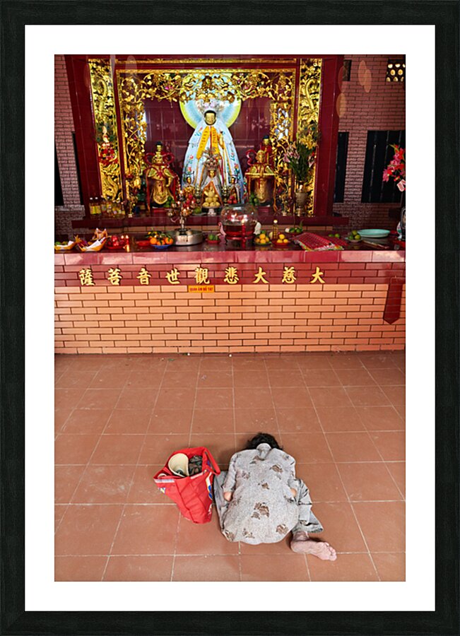 Worship at a temple in Ho Chi Minh City Vietnam Picture Frame print