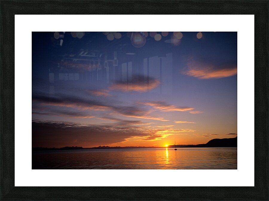 Midnight sun sets over water in Longyearbyen Norway Picture Frame print
