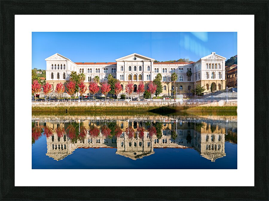 University building reflects in water in Bilbao Spain Picture Frame print
