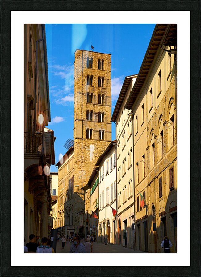 People walk along a street in Arezzo Tuscany Italy Picture Frame print