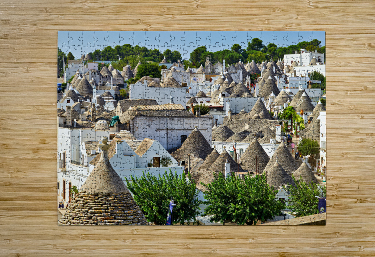 Apulia Puglia Italy. Alberobello. Trulli: traditional Apulian dry stone huts with a conical roof. Marco Brivio Puzzle printing