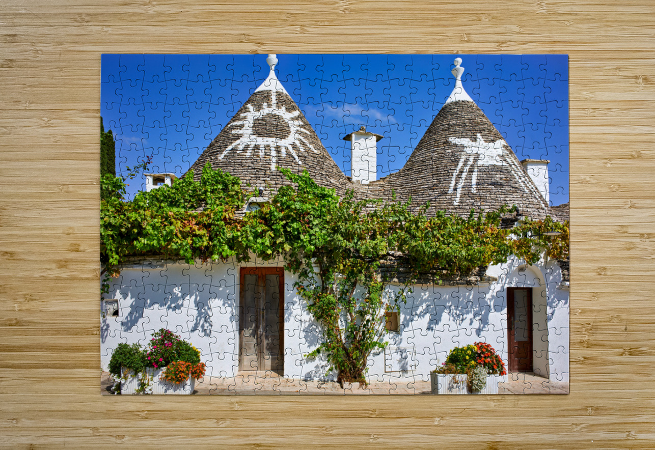 Apulia Puglia Italy. Alberobello. Trulli: traditional Apulian dry stone huts with a conical roof. Marco Brivio Puzzle printing