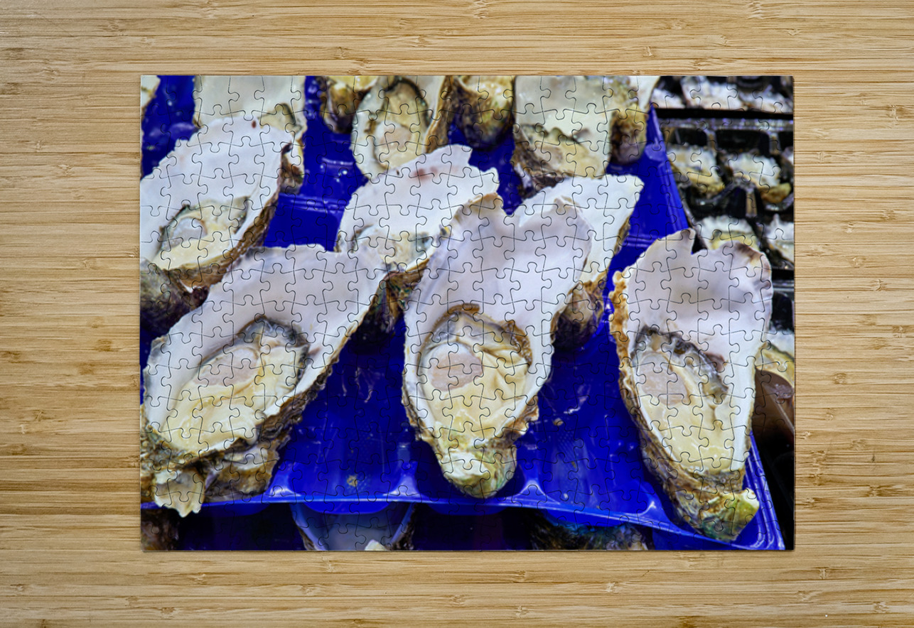 Freshly shucked oysters on blue plastic trays. Marco Brivio Puzzle printing