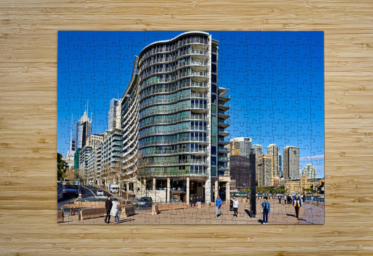 Modern curved building with balconies and city skyline. Marco Brivio Puzzle printing