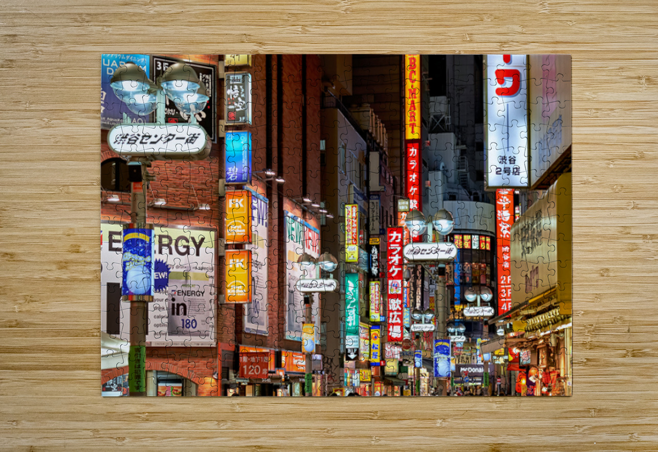 Neon lights shine bright in Shibuya district at night in Tokyo Marco Brivio Puzzle printing