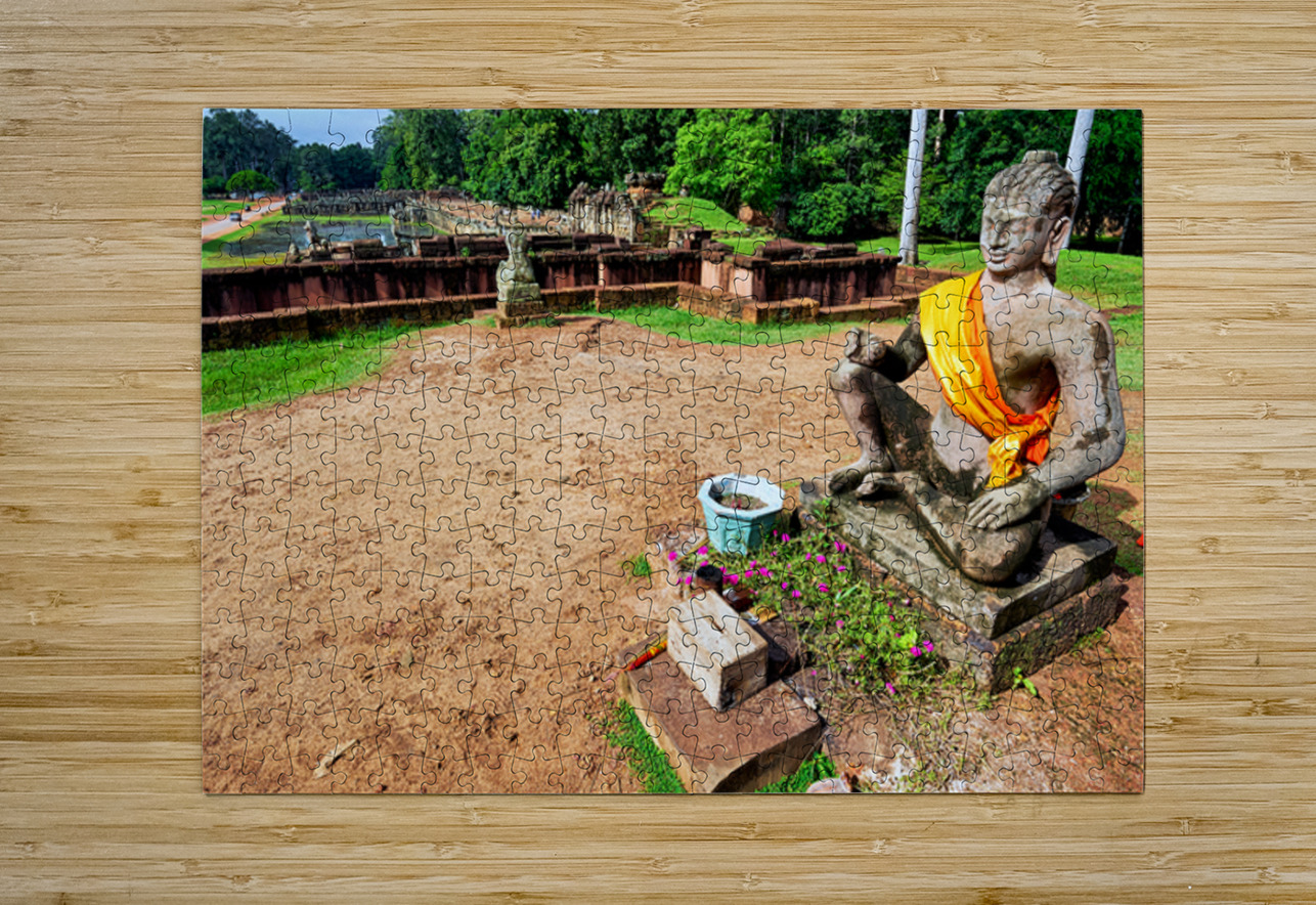 Ancient statue overlooks temple ruins amidst lush greenery. Marco Brivio Puzzle printing