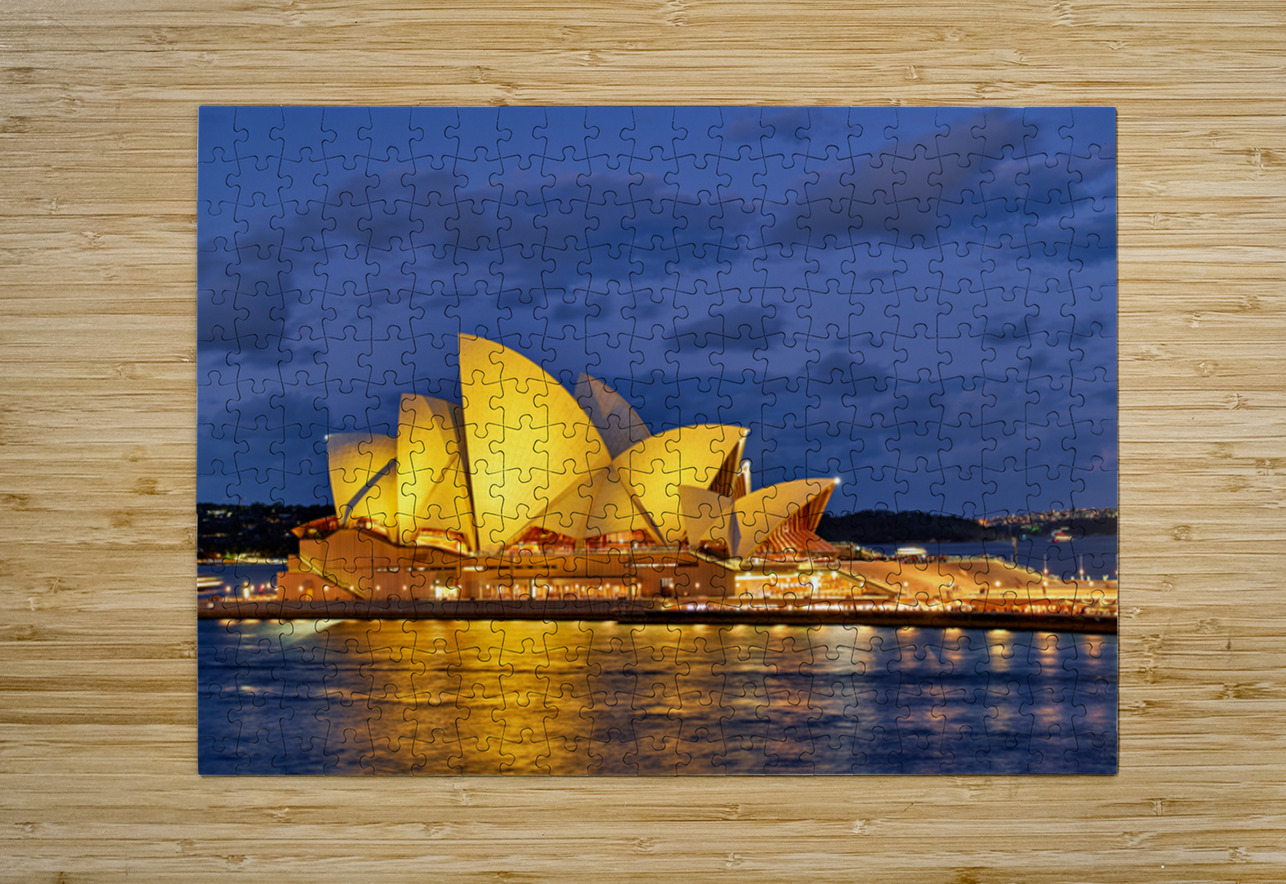 Sydney Opera House illuminated at dusk with harbor lights. Marco Brivio Puzzle printing