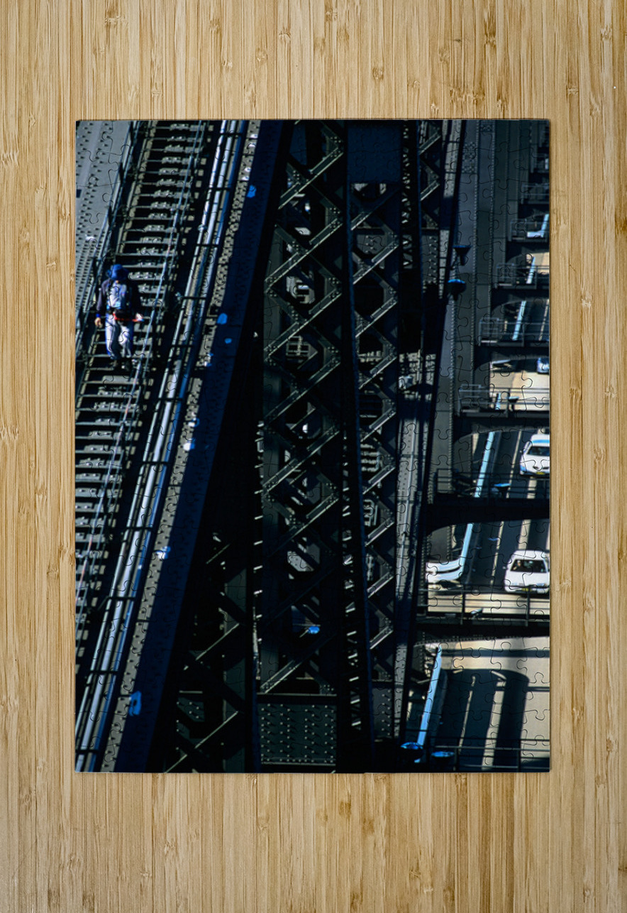 Man walks on bridge with cars below Marco Brivio Puzzle printing