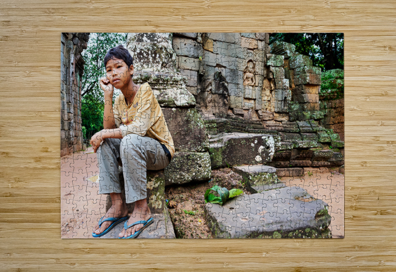 Young person sits on ancient temple ruins. Marco Brivio Puzzle printing
