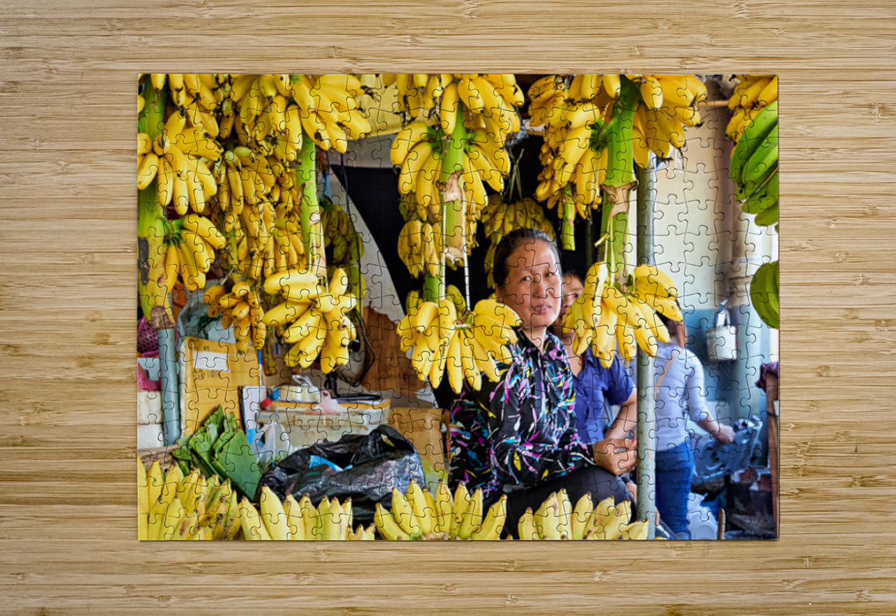 Market vendor surrounded by abundant yellow bananas. Marco Brivio Puzzle printing