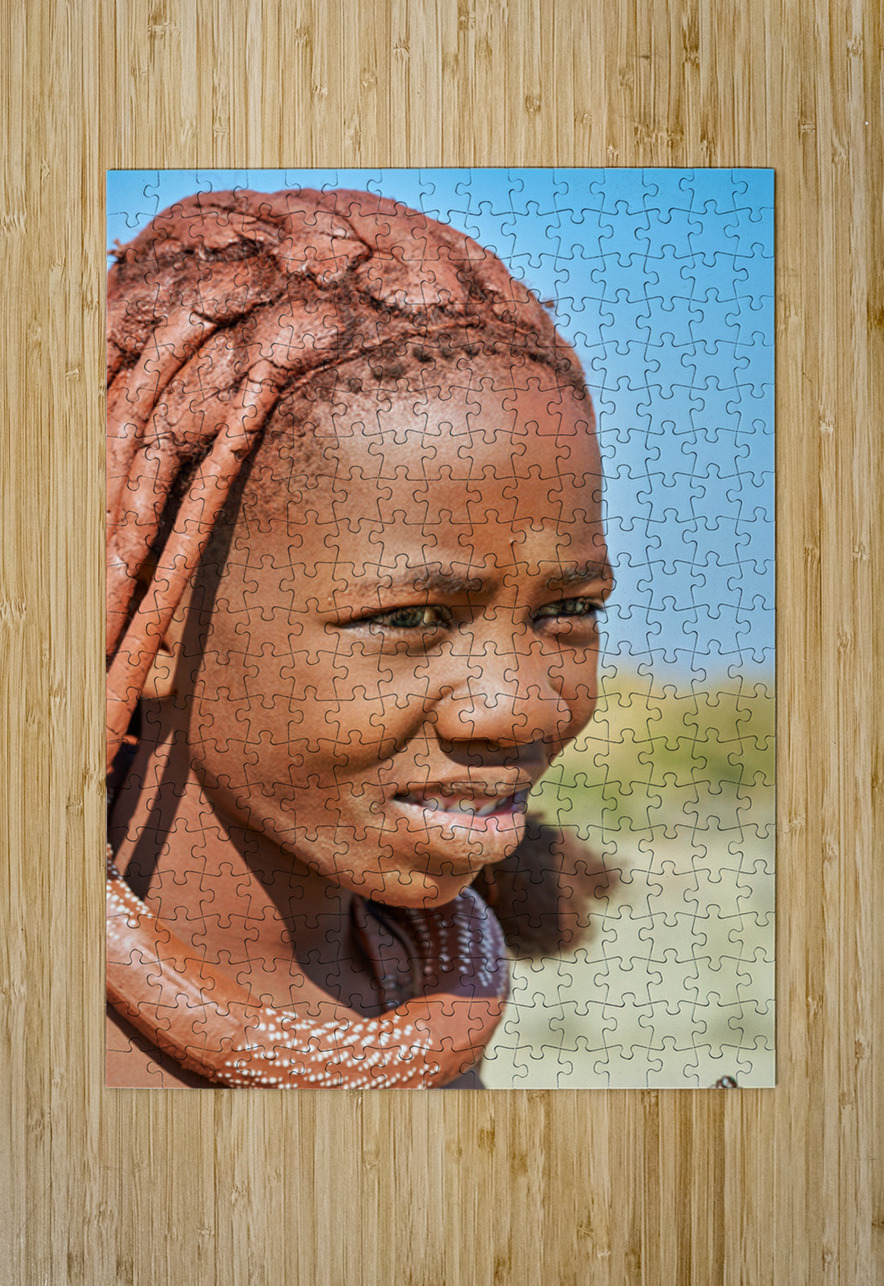 Portrait of a Himba woman in Kunene region of Namibia during the Marco Brivio Puzzle printing