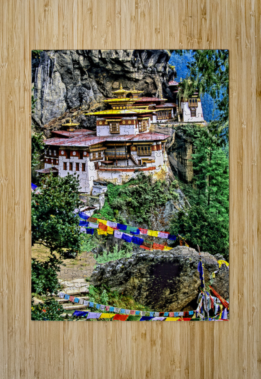 Iconic Bhutanese monastery on a cliff surrounded by prayer flag Marco Brivio Puzzle printing
